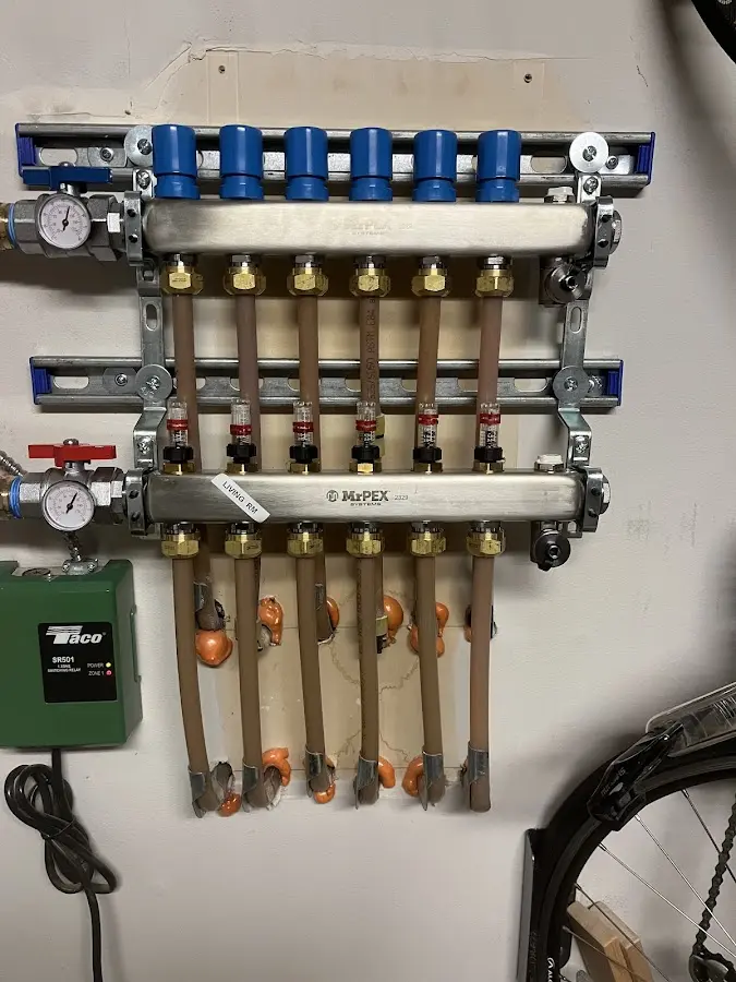 Plumber performing Gas Line Installation at a residential property in East Flat Rock